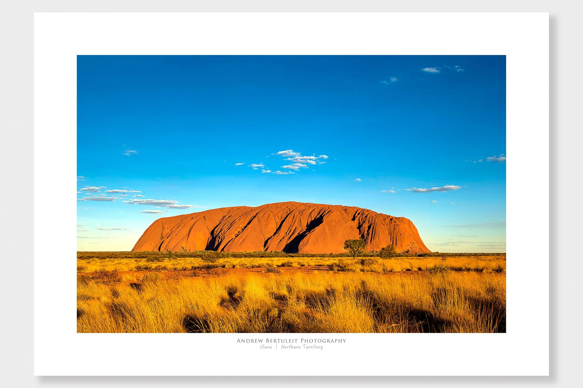 Uluru sunset print with white border, ready for a standard frame.
