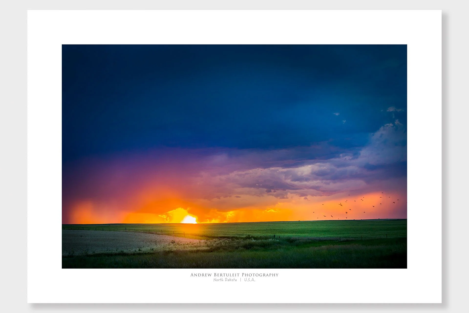 North Dakota prairie storm sunset print with white border, ready for a standard frame.