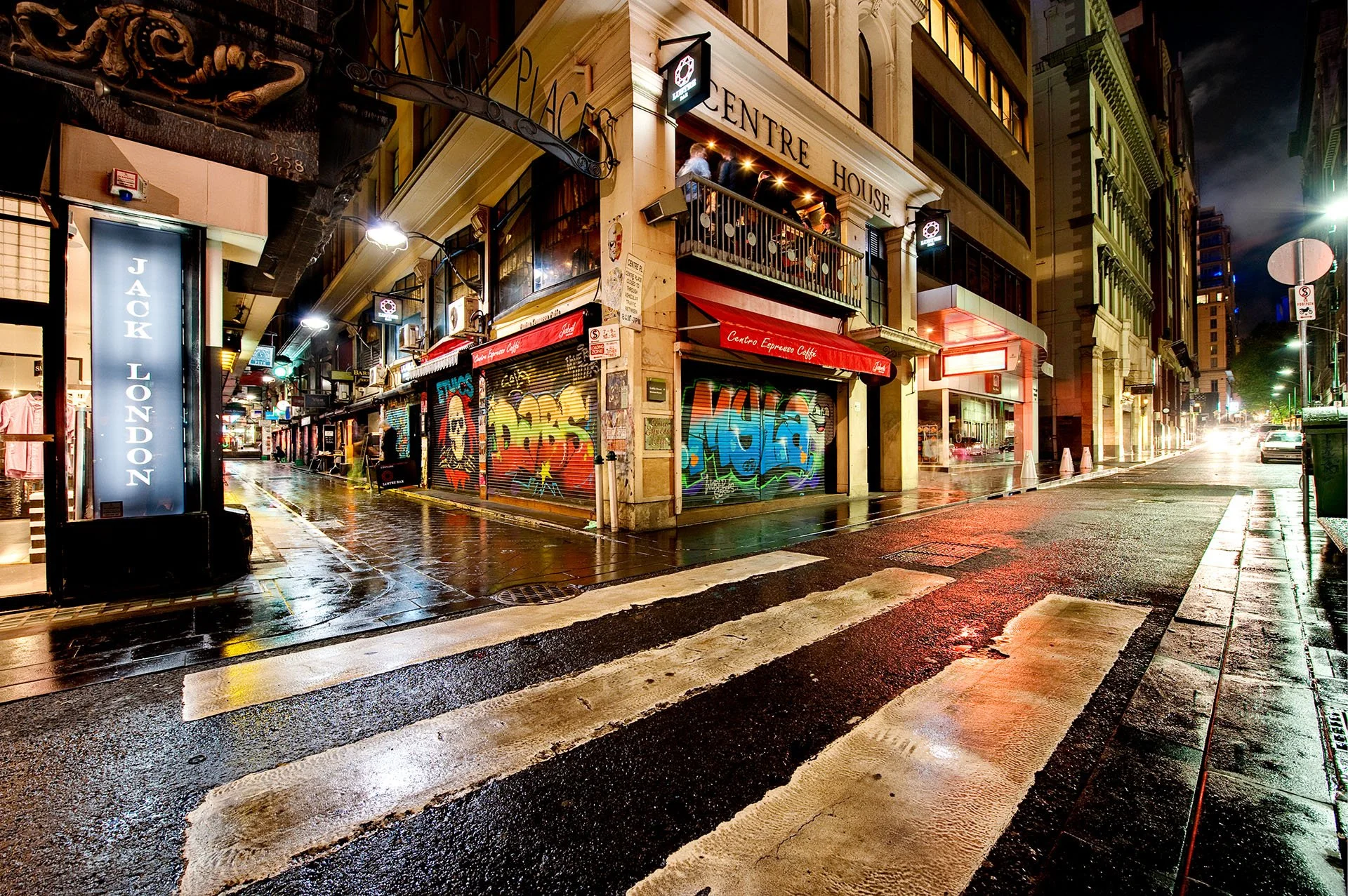 Rainy nighttime street scene in Melbourne