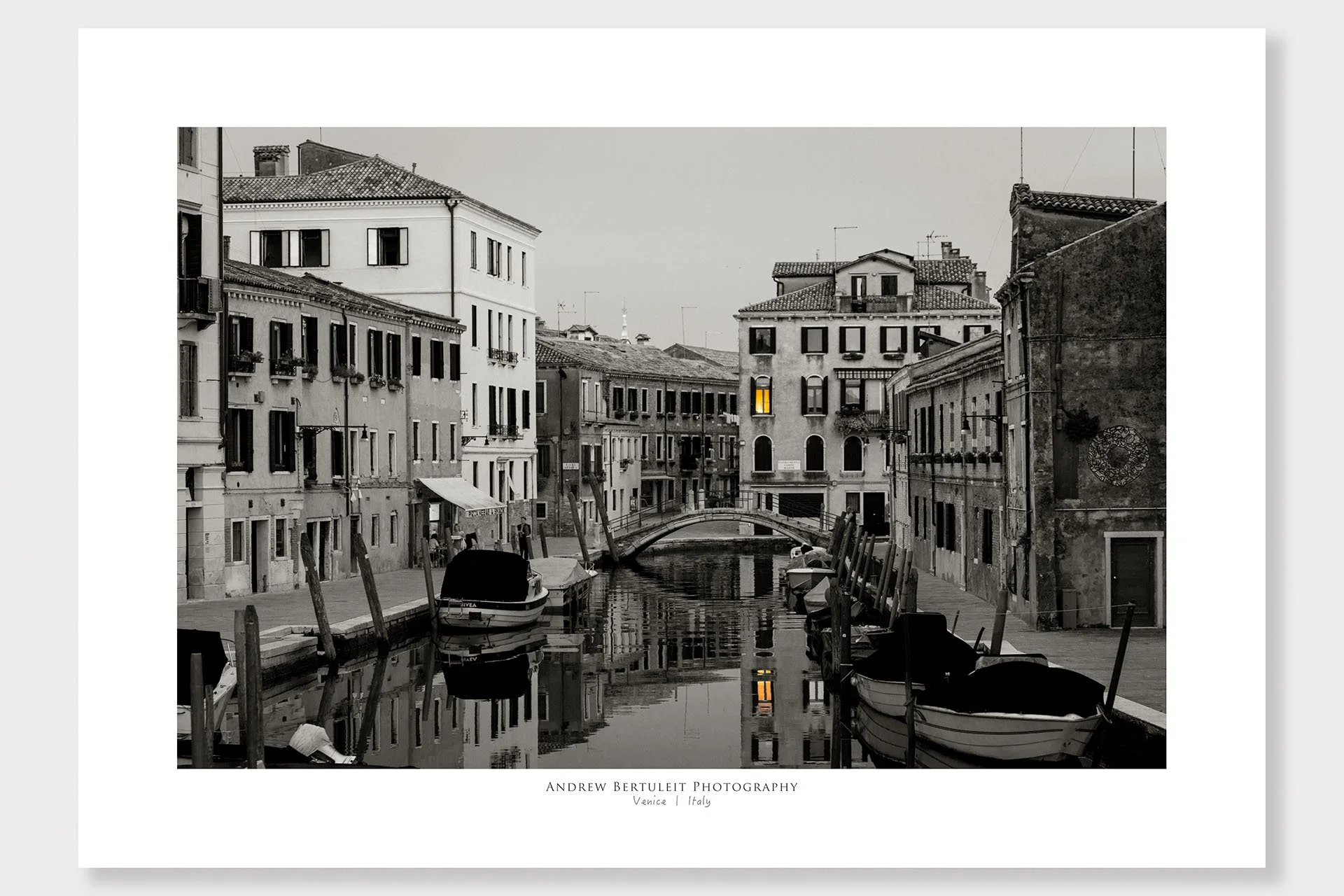Venice canal with yellow window print with white border, ready for a standard frame.