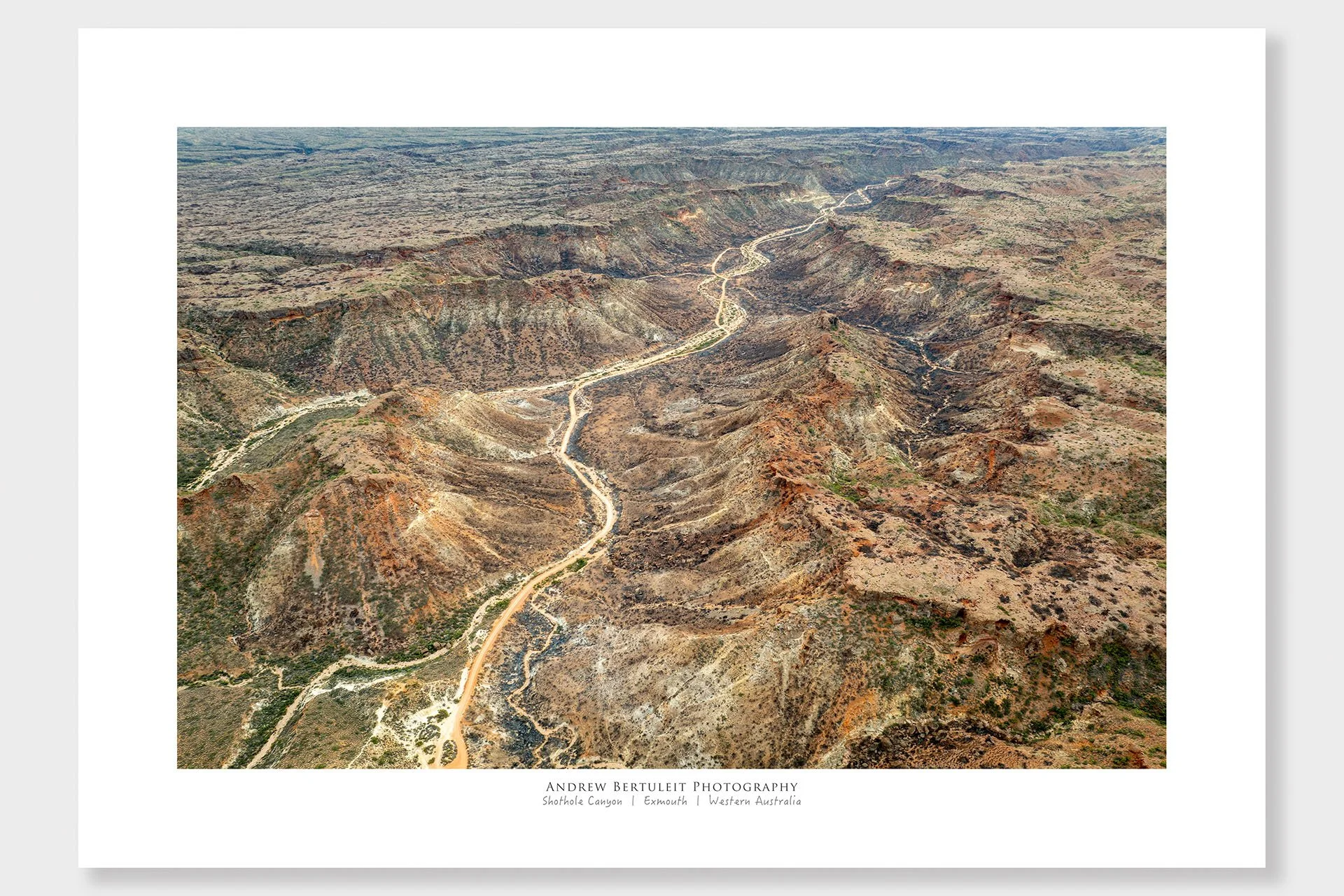 Shothole Canyon Exmouth aerial print with white border, ready for a standard frame.