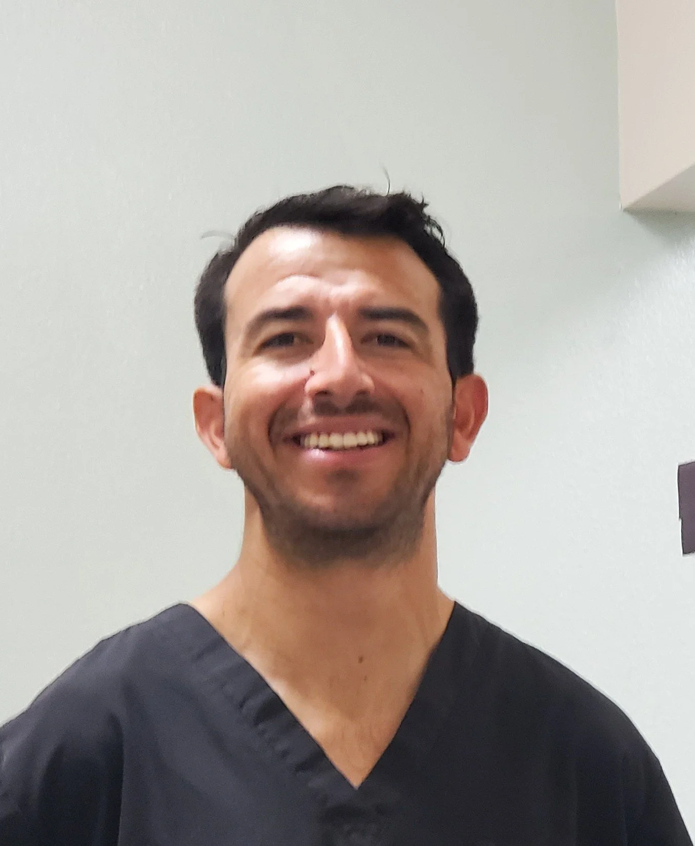 Abraham Catellanoss taking a photo at the dental operatory. Where dentists either make it or don't.