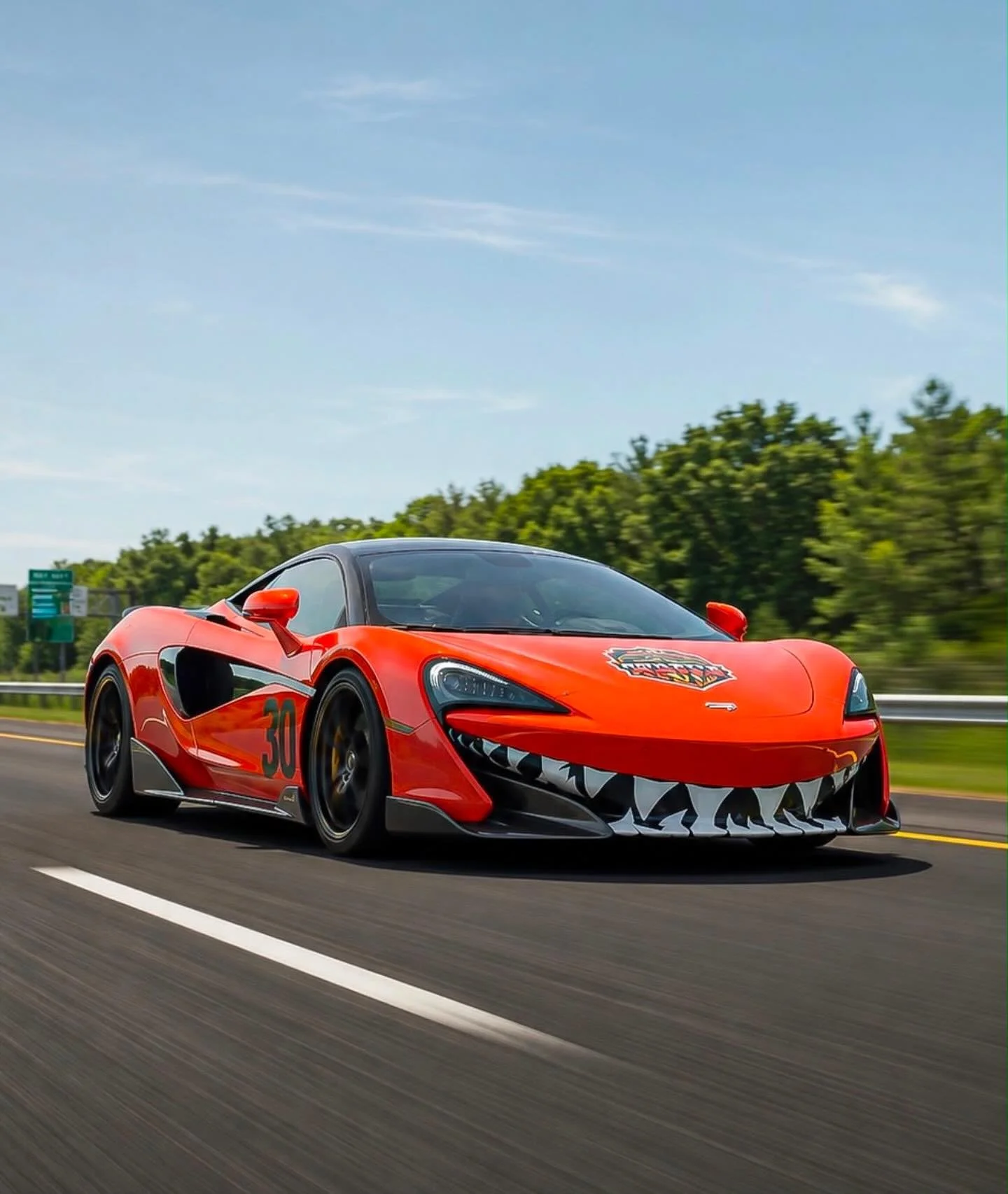 @mickbeth cruising off in her 600LT Helios Orange 🍊 (McLaren says orange, our eyes say red, we&rsquo;ve agreed to disagree). One of the most iconic cars in the members fleet, wearing that signature aggressive grin right before disappearing into the 