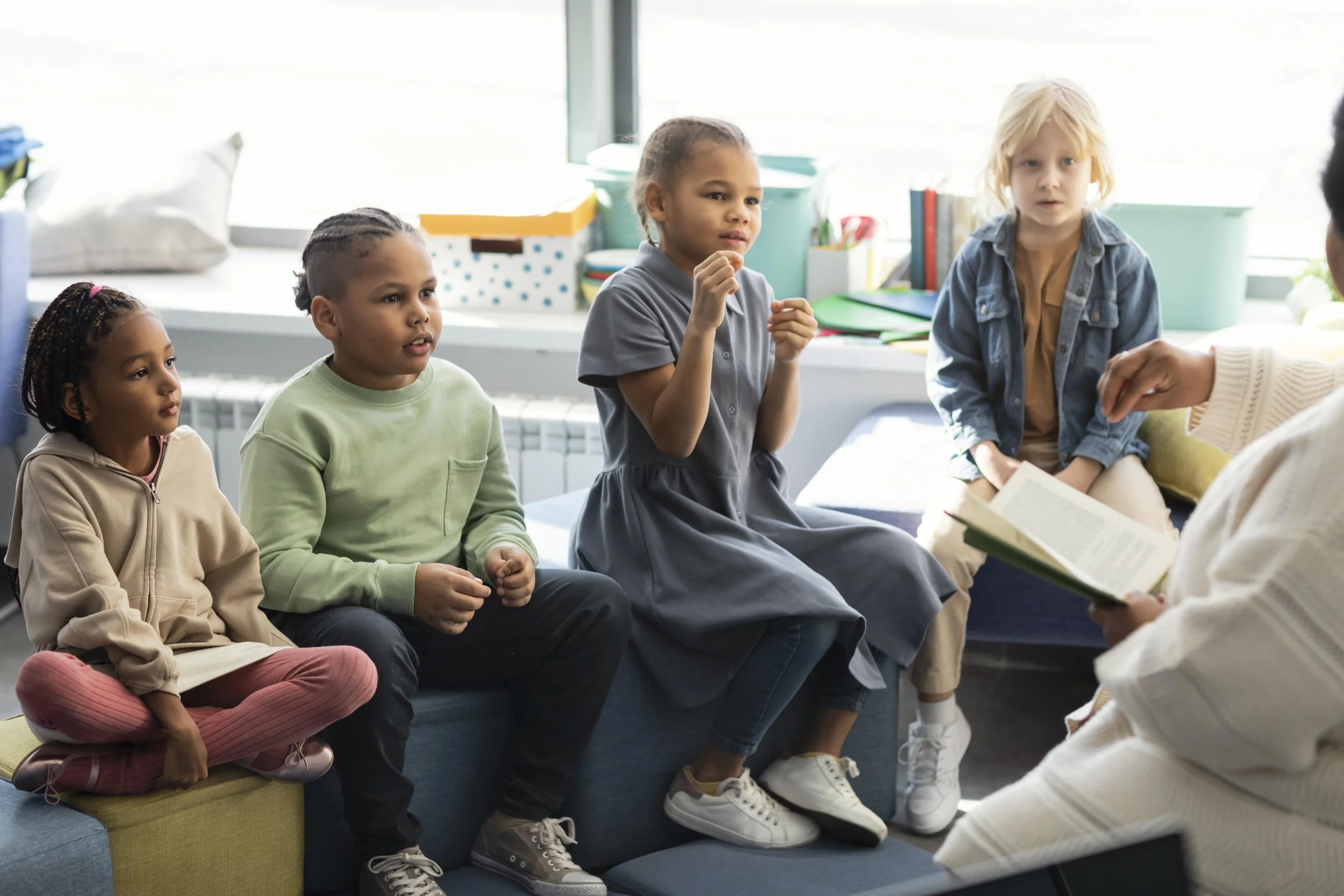 female-teacher-reading-her-pupils.jpg