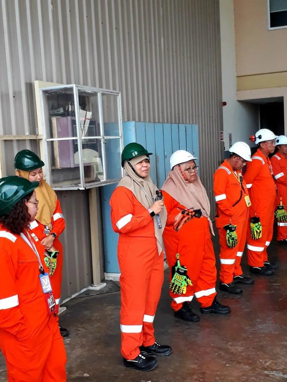 Engaging with the STL Muara Port team through a productive Toolbox Talk and PPE Health Check session promoting workplace safety and well-being.