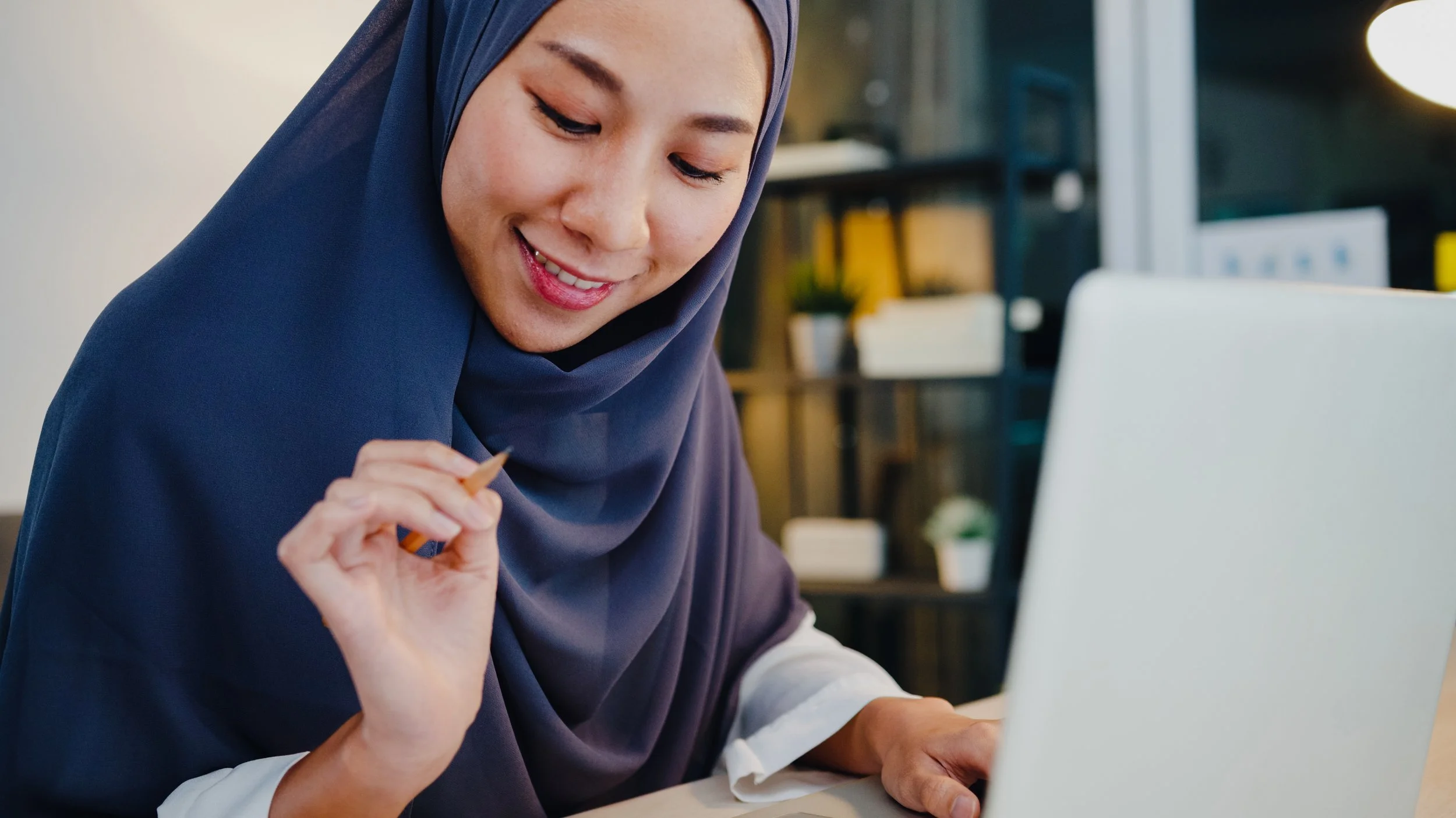beautiful-muslim-lady-headscarf-casual-wear-using-laptop-living-room-night-house.jpg