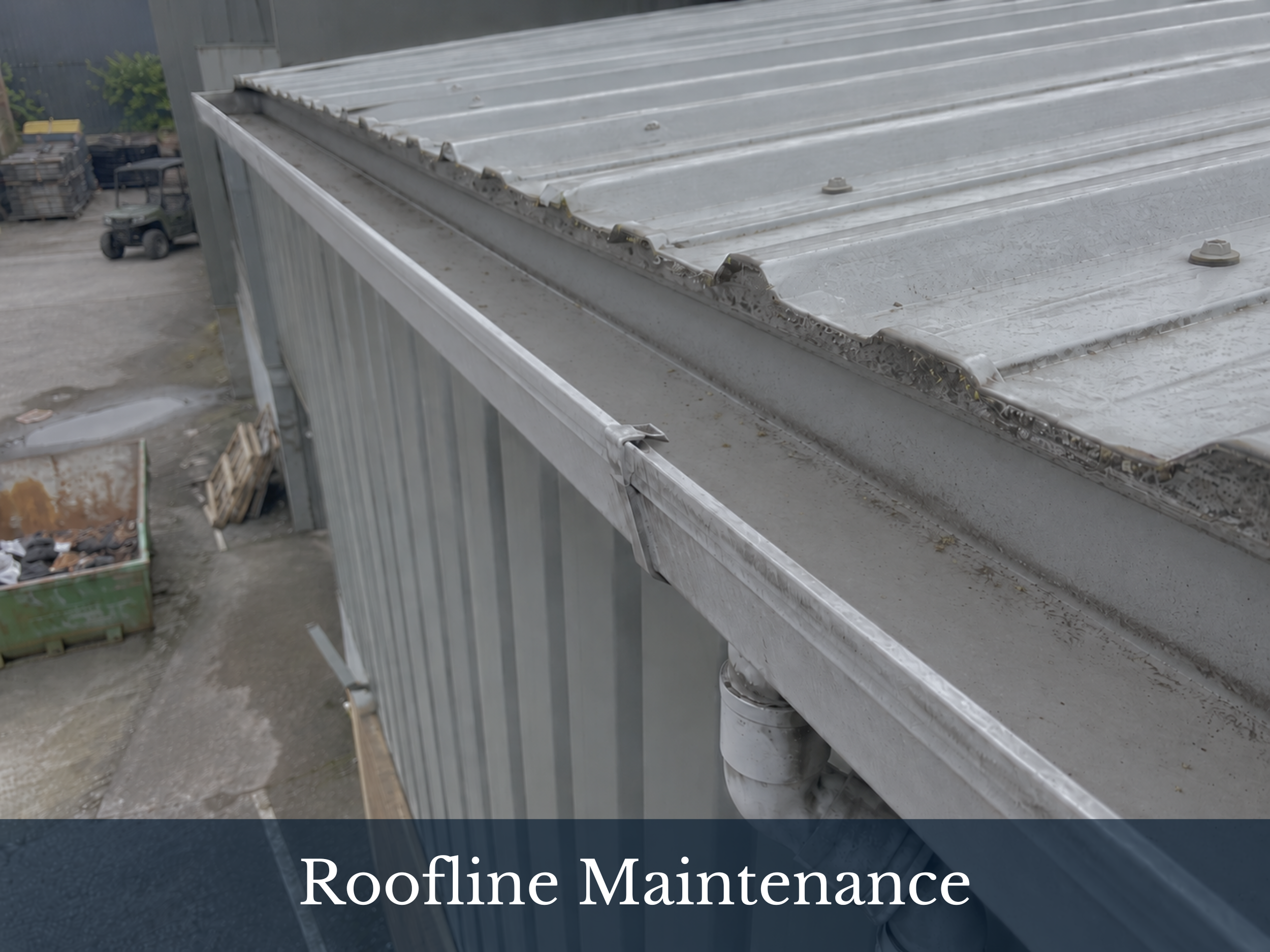 Close-up of a metal roof with roofing maintenance equipment and tools nearby.