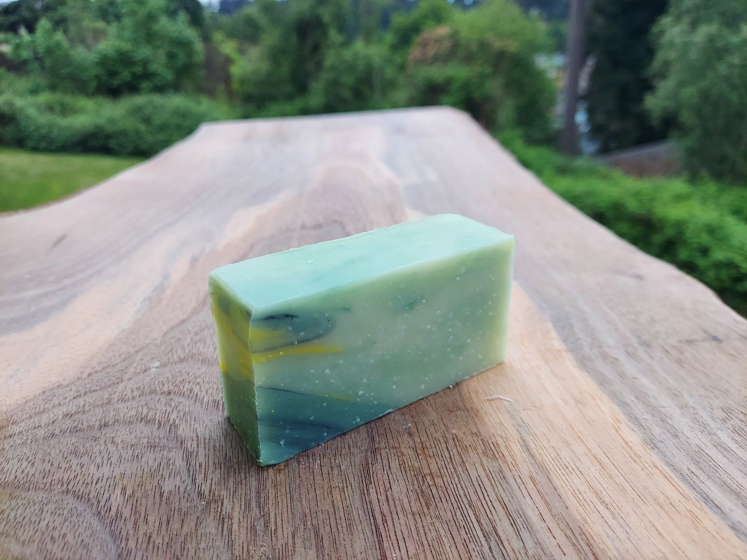 Small rectangular bar swirled with yellow, light green and dark green.