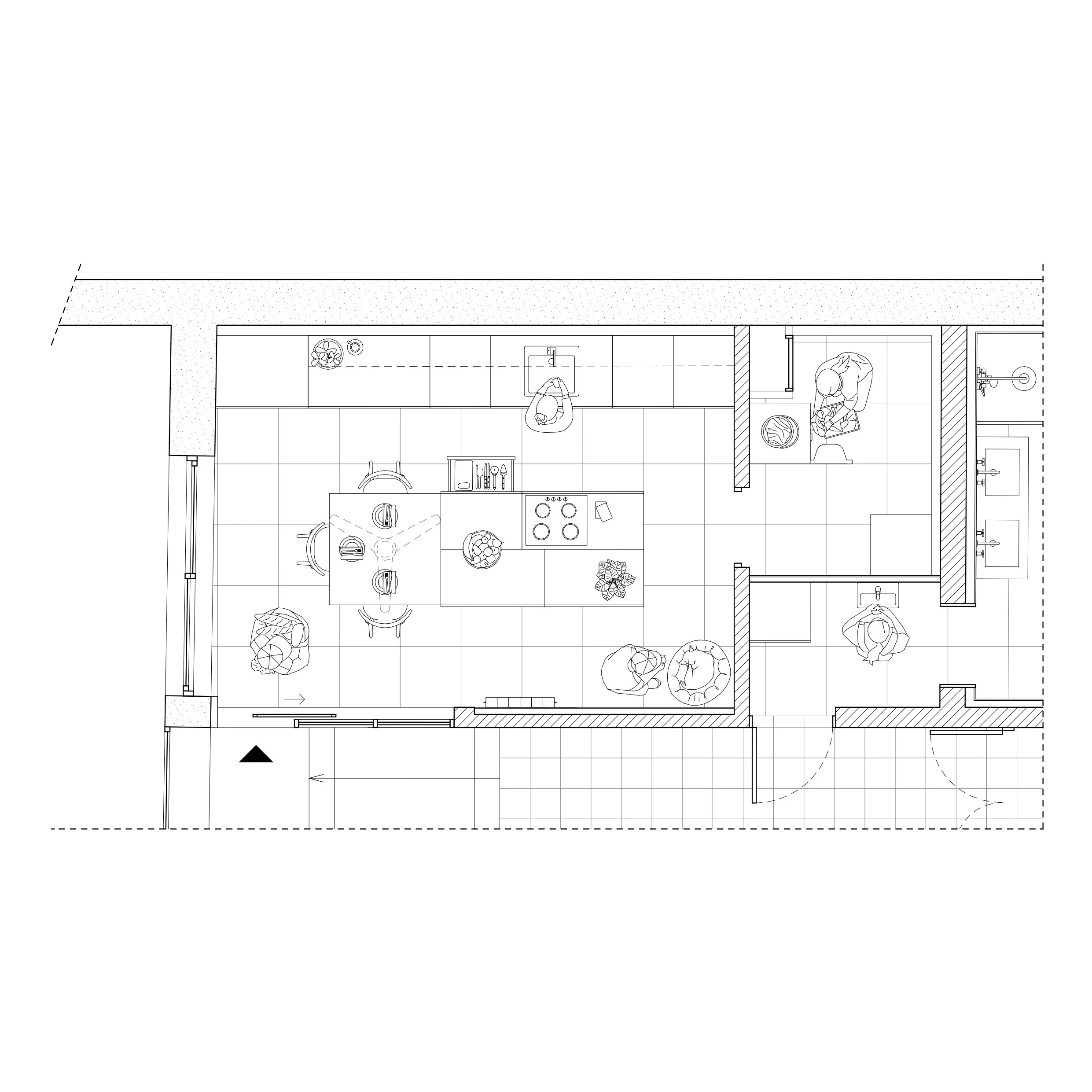Plan d'aménagement intérieur d'une maison, montrant une cuisine avec comptoir, évier, appareils électroménagers, et un coin repas avec table et chaises, ainsi que des zones adjacentes.