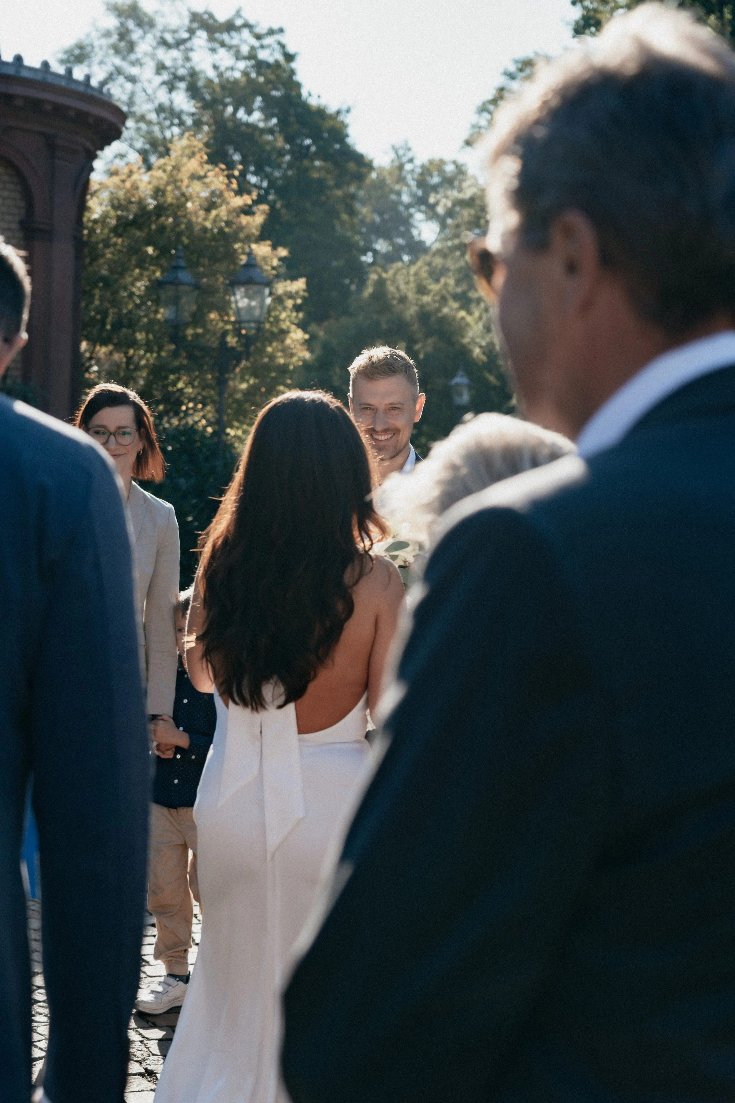 Groom looking at bride smiling before the civil wedding ceremony, Bad Homburg Germany.
