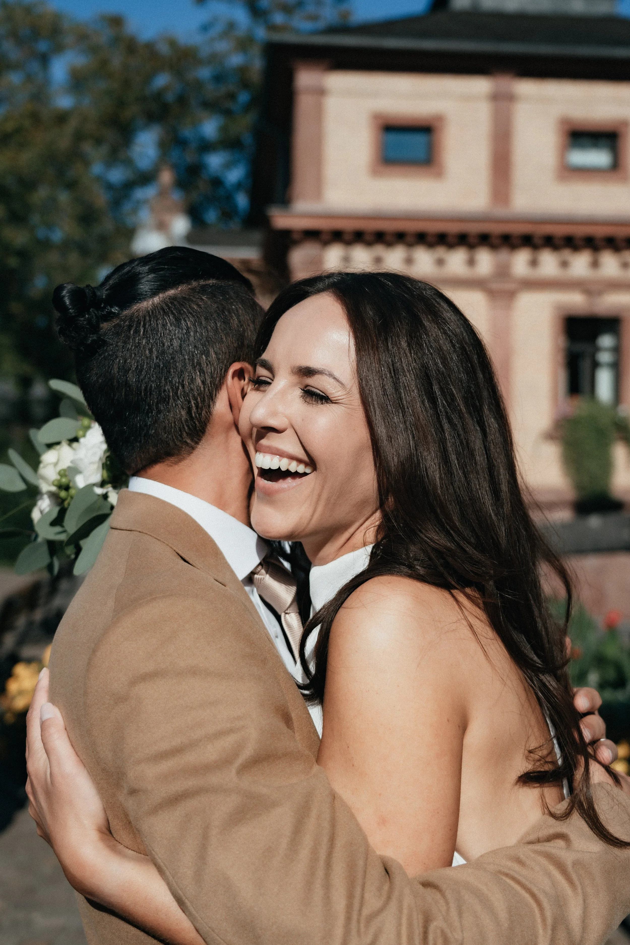 Emotional and happy moment of bride after wedding ceremony, Bad Homburg, Germany.