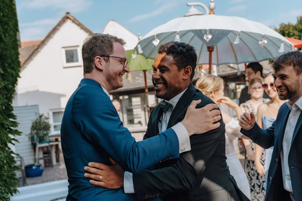 Wedding guest and groom are emotional after wedding ceremony, photographed by Jessica Di Salvo.