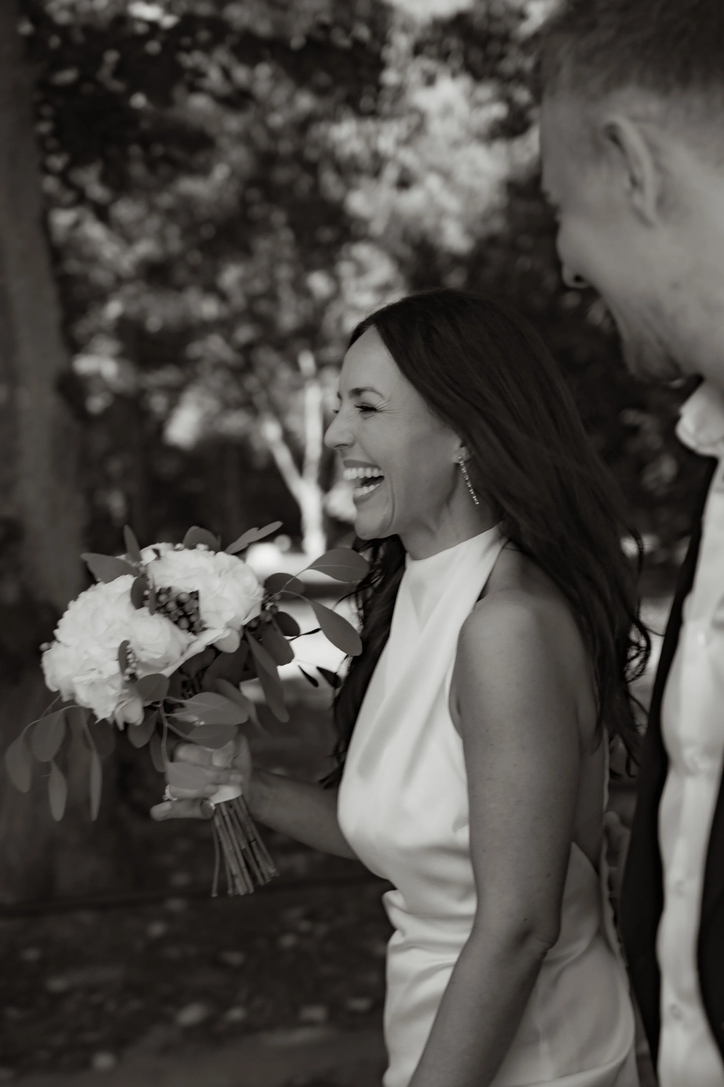 Bride and groom walking in the park to the ceremony, laughing. Taken by Di Salvo, Bad Homburg, Germany.
