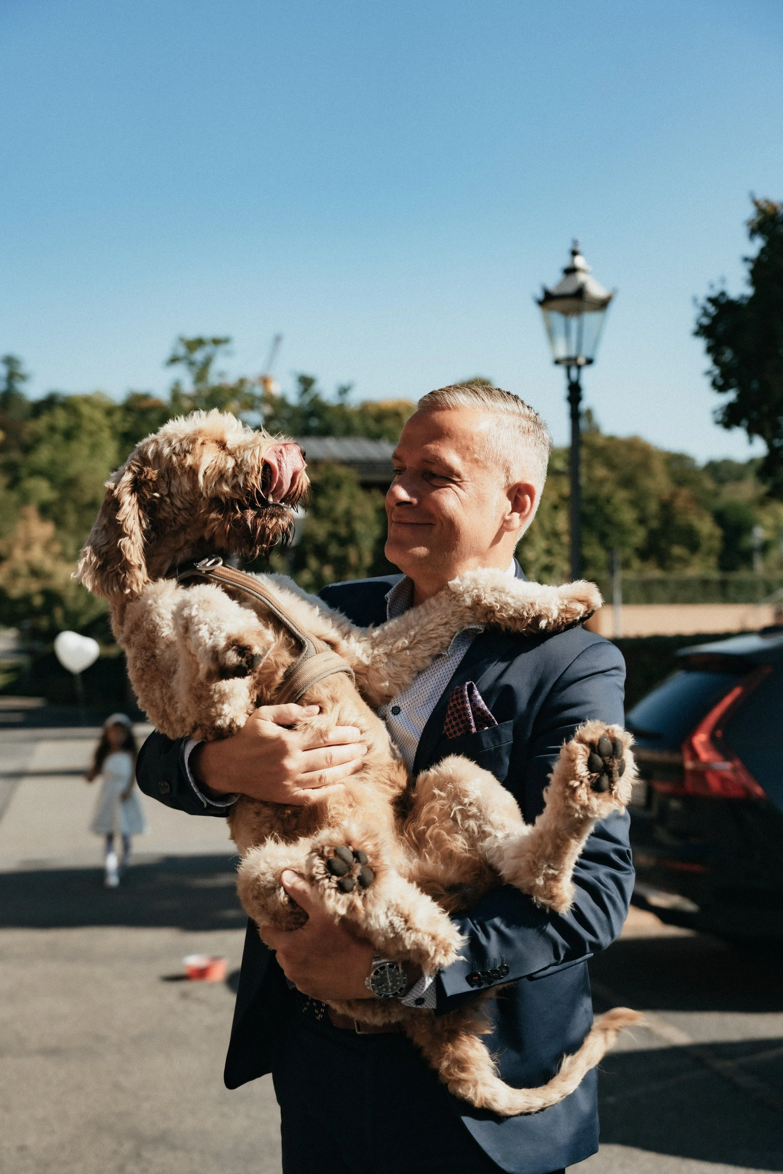 Dog as a special wedding guest at the small wedding.