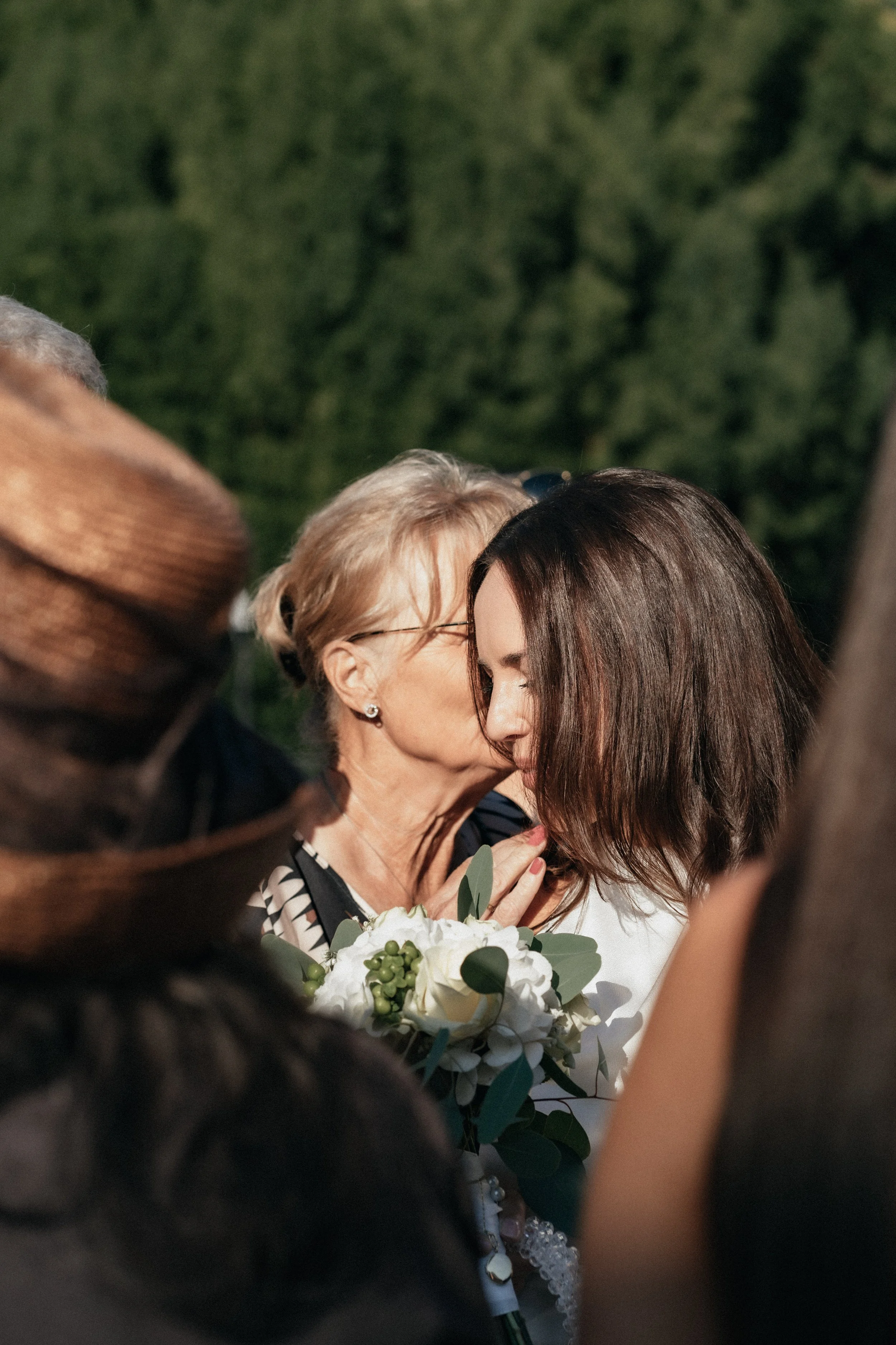 Moment between bride and mom before the ceremony by wedding photographer Di Salvo.
