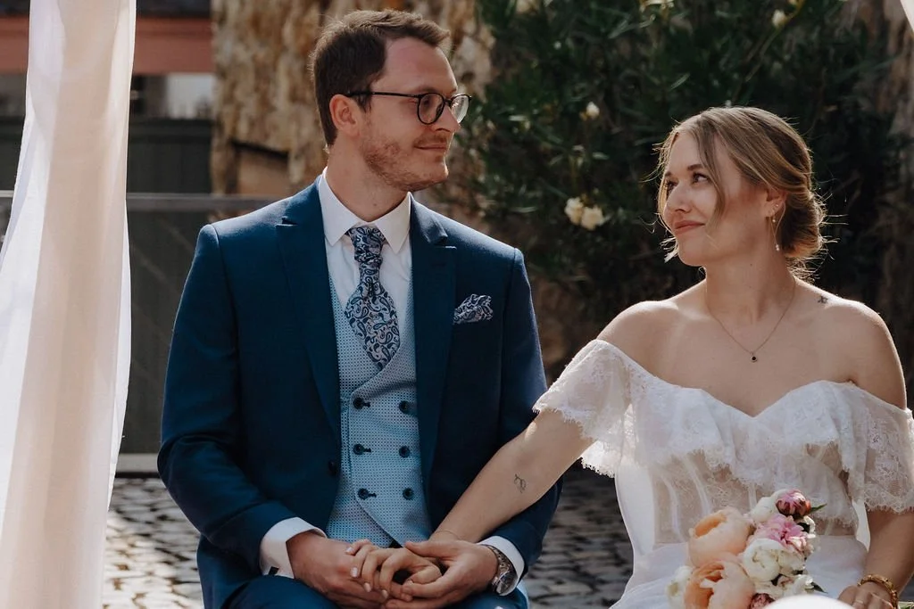 Emotional moment of couple during ceremony by wedding photographer Jessica Di Salvo.