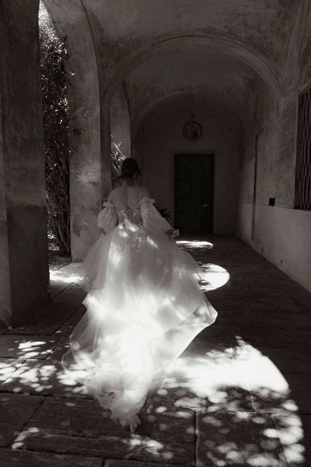 Black and white portrait of bride with dramatic light, Lake Como, Italy
