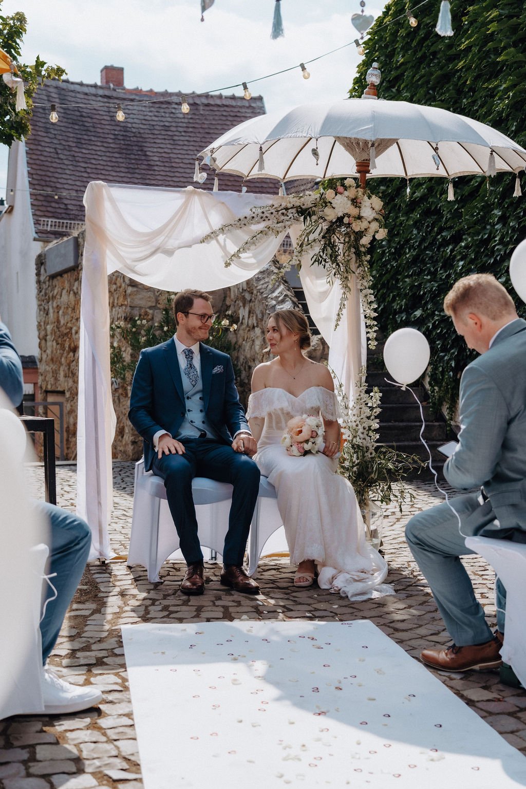 Emotional ceremony moment between groom and bride by cinematic wedding photographer Jessica Di Salvo.