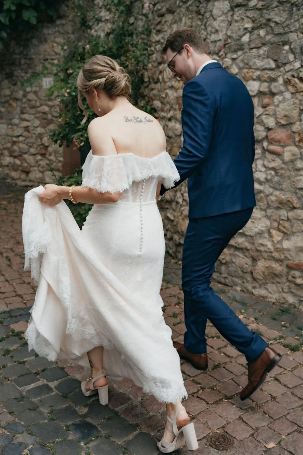 Couple walking side by side on their way to the wedding ceremony by Jessica Di Salvo.