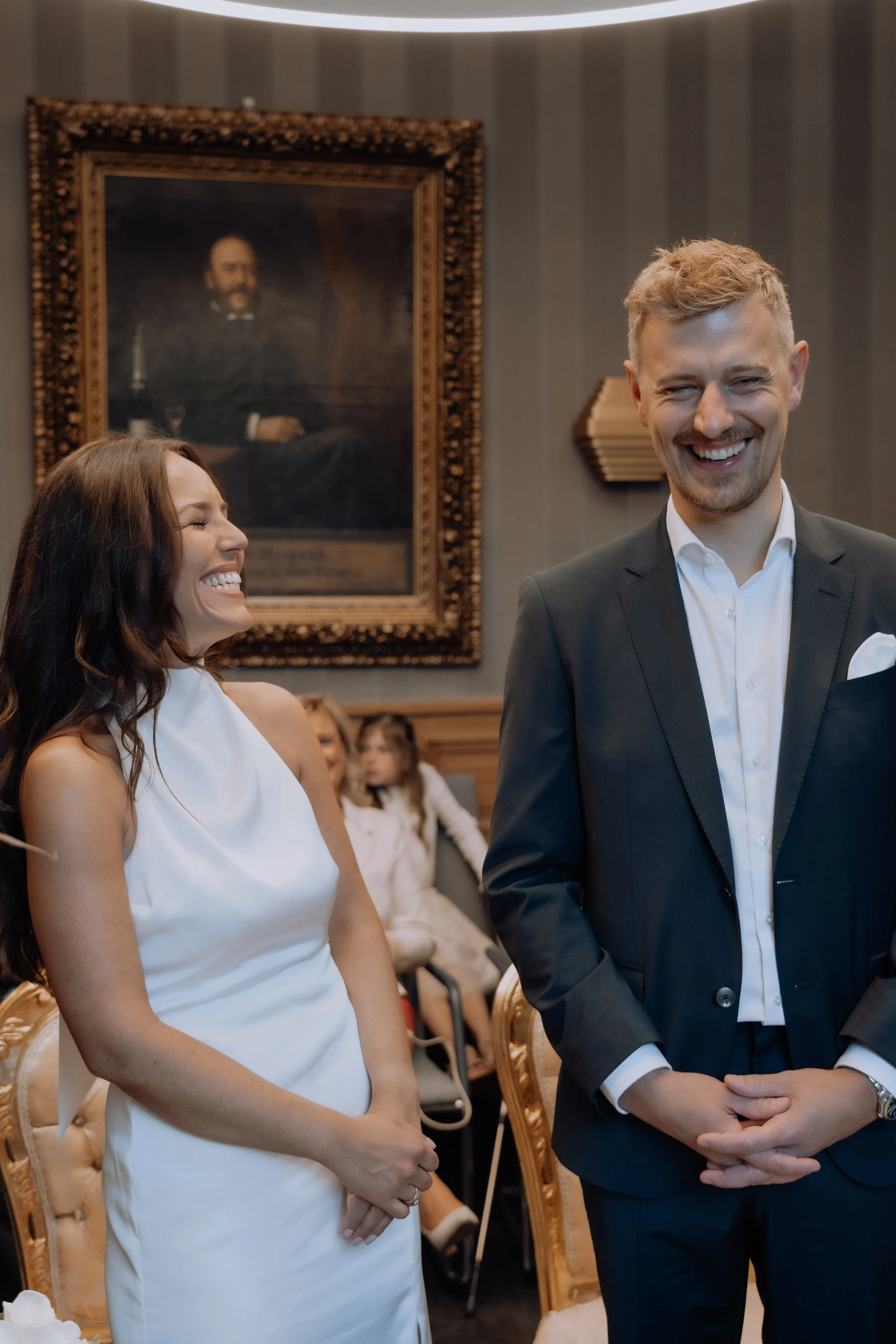 Civil wedding ceremony couple laughing taken by storytelling photographer Jessica Di Salvo.
