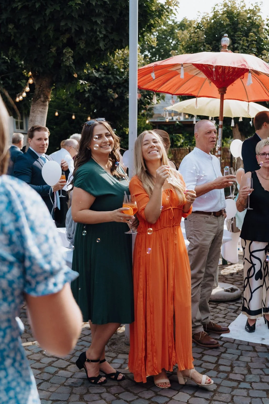 Wedding guests enjoying wedding during reception by cinematic wedding photographer Jessica Di Salvo.