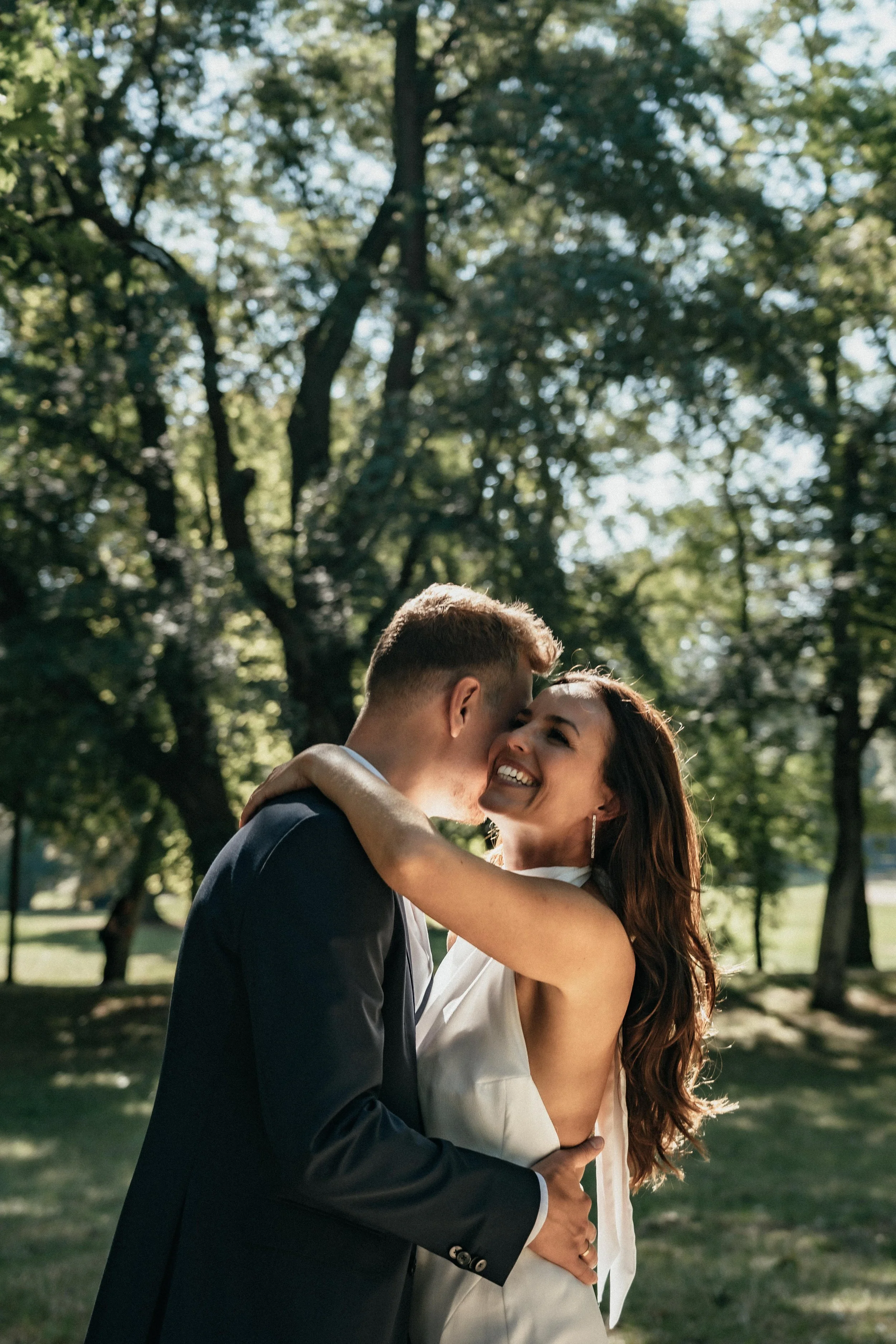 Groom talking to bride which makes her smile, Bad Homburg, Germany.