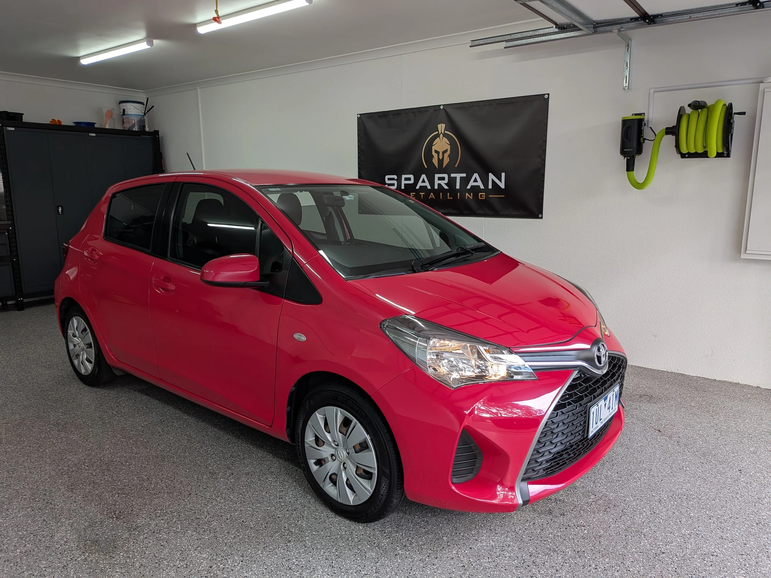 2014 Pink Toyota Yaris in for a deep clean and sealant treatment.