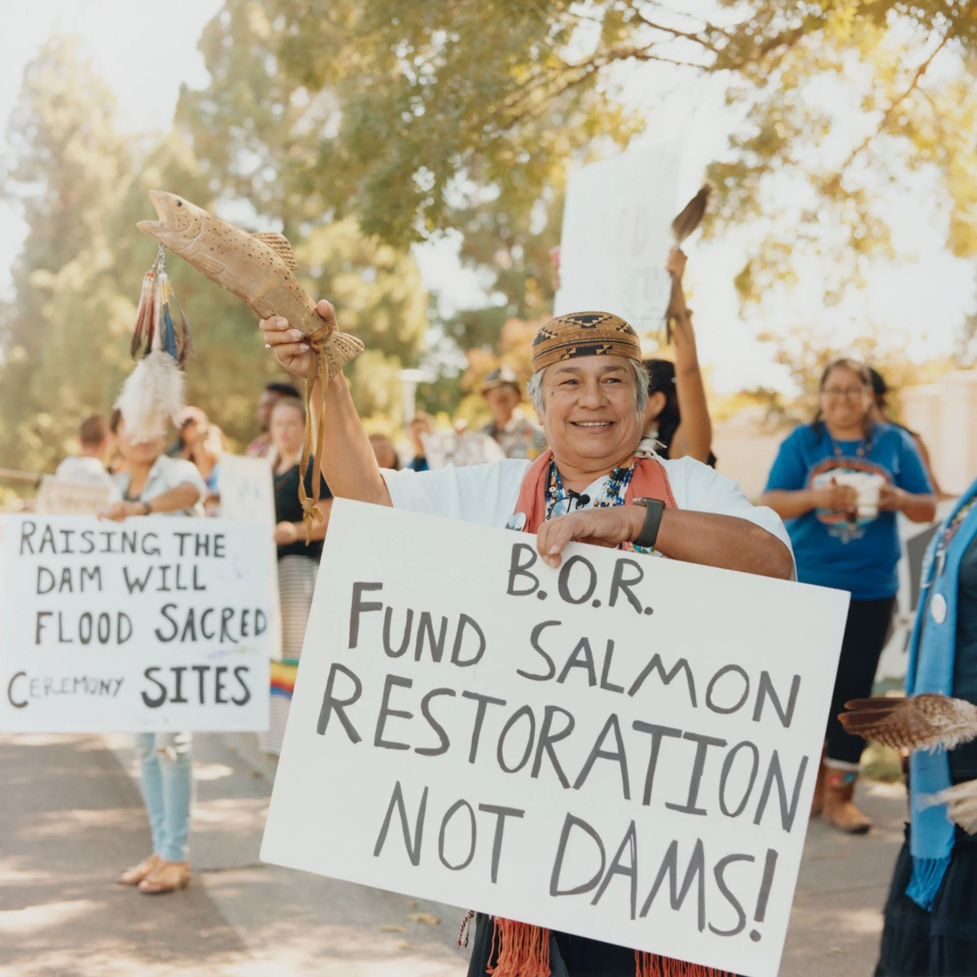 Chief Caleen of the Winnemem Wintu Tribe in Northern California holds a handmade sign during a protest at the Bureau of Reclamation in Sacramento, CA. The Tribe wants the BOR, who manages the Shasta Dam and is in charge of implementing fish and wildl