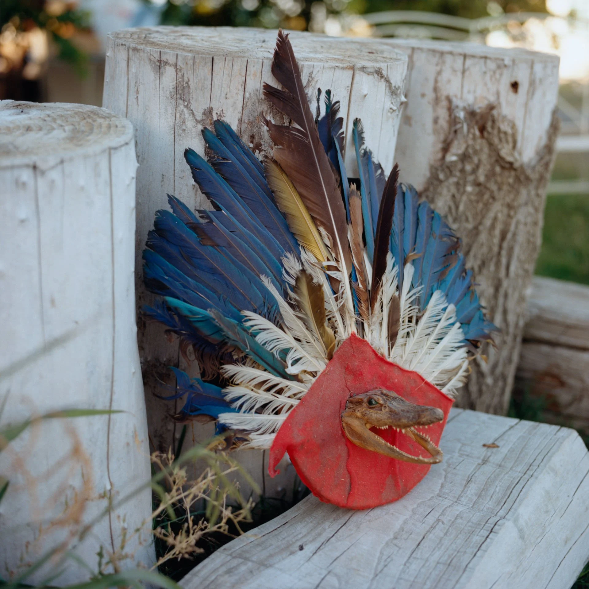 A ceremonial shield sits nearby during preparation for a sweat lodge ceremony at Deganawidah-Quetzalcoatl University.