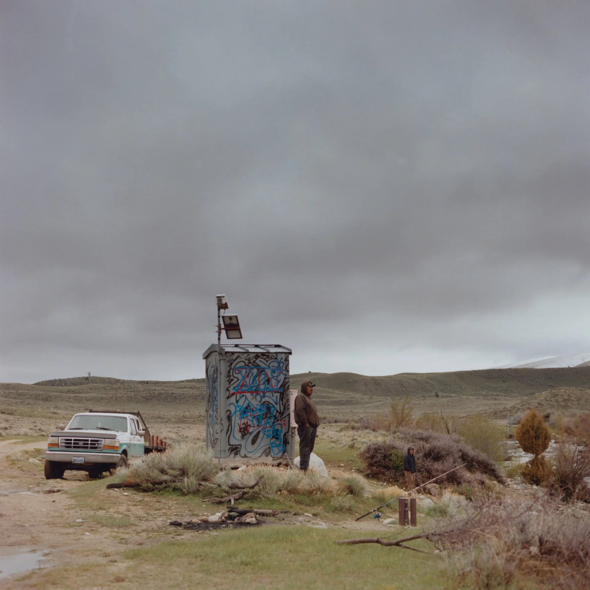 A group of people fishing at a resevoir on the Wind River Indian Reservation.