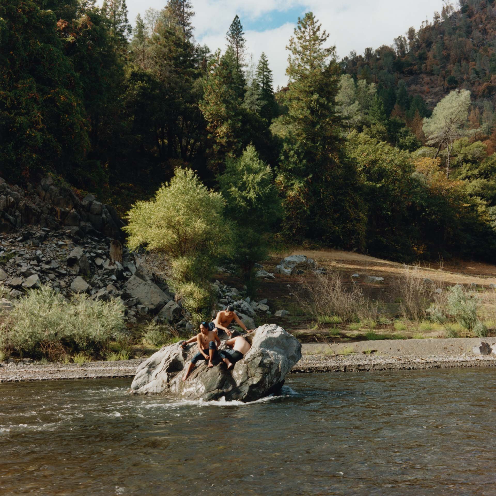 Members of the Winnemem Wintu Tribe wait for the arrival of the participants of “Run4Salmon” to their sacred grounds on the McCloud River.