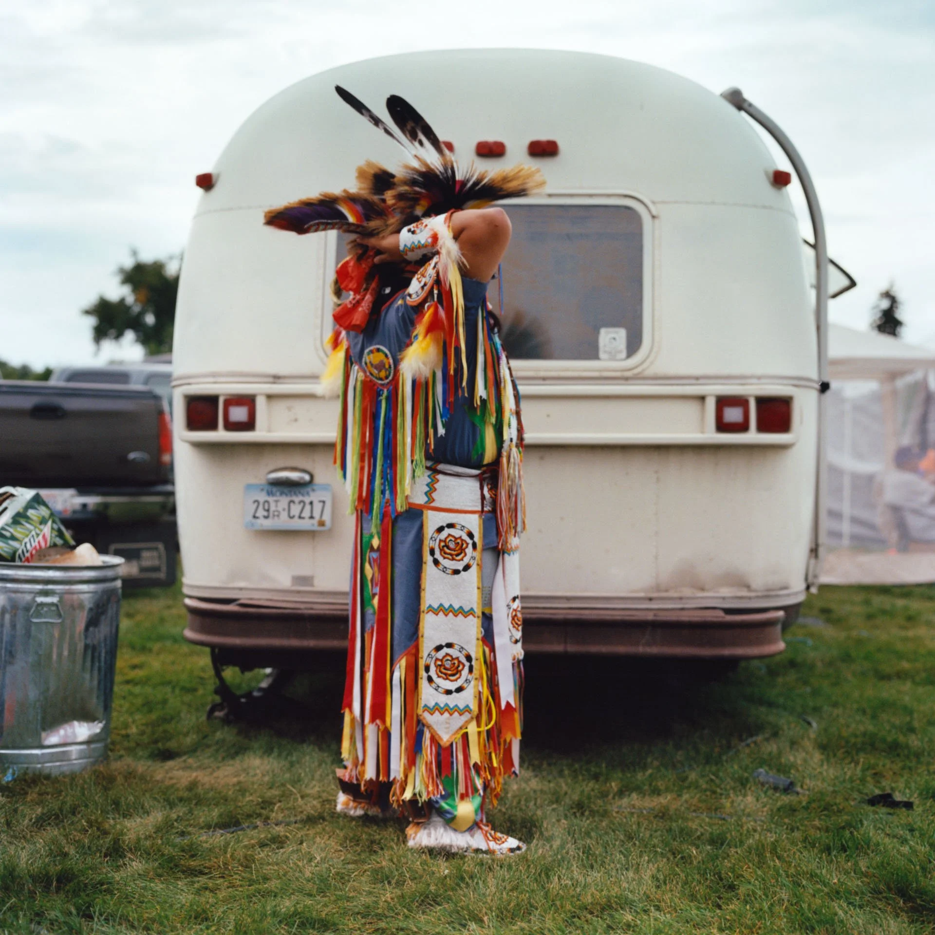 A dancer gets ready a the United Tribes International Pow wow in Bismarck, North Dakota. A pow wow is a gathering of intertribal American Indians to celebrate their heritage through dance, song, food, traditional regalia and renewing of friendships. 