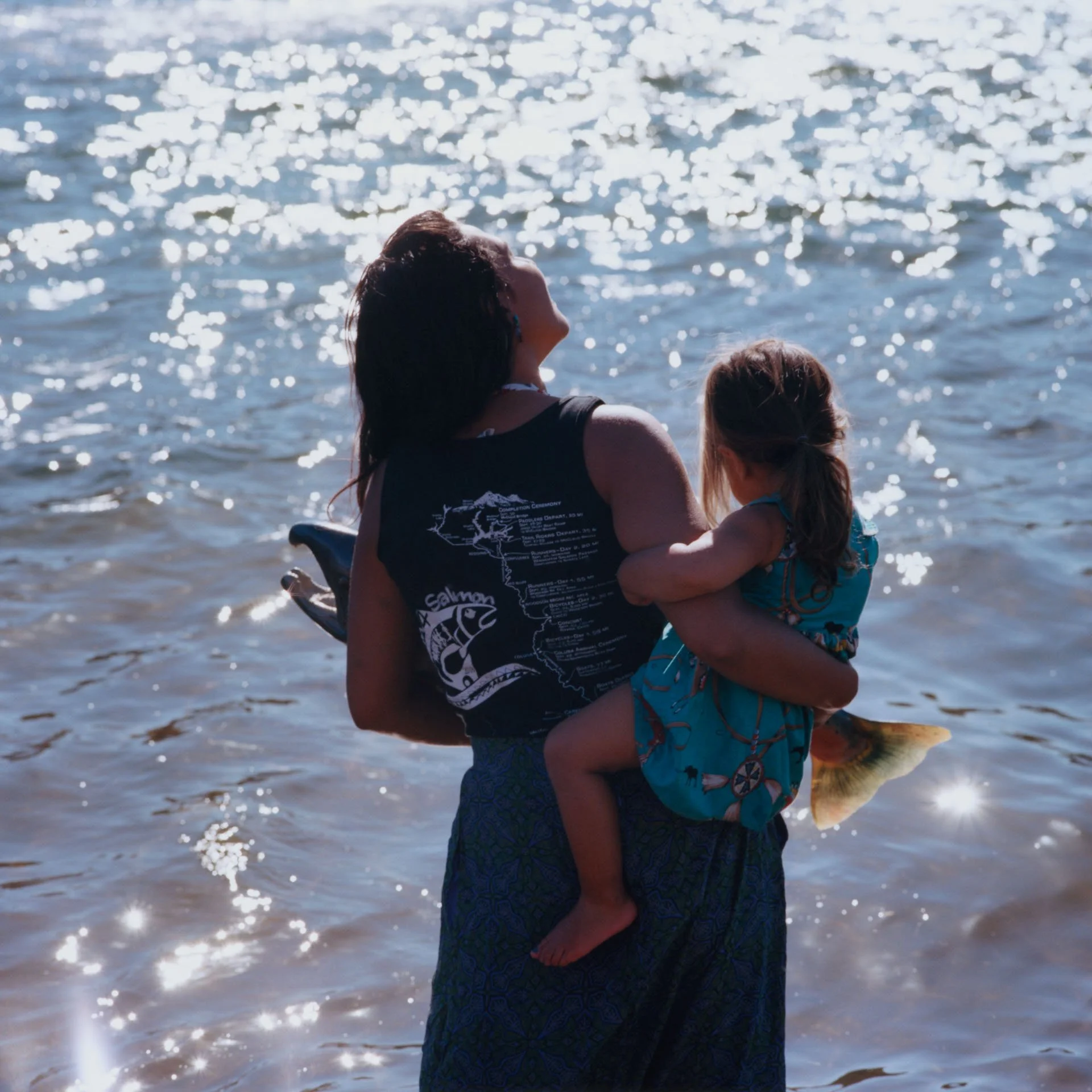Luna and her daughter Sequoia take a moment during the Run4Salmon journey to pray for the salmon and the healing of the waterways.
