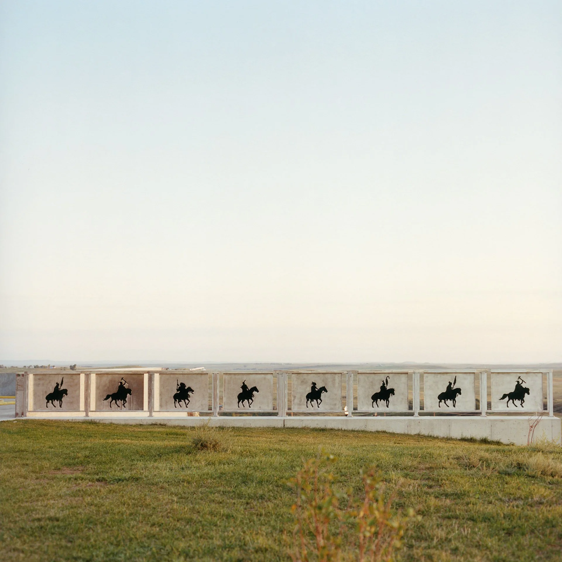 The silhouettes of war chiefs on horses are engraved on decorative fences just outside Prairie Knights Casino, located on the Standing Rock Indian Reservation in North Dakota