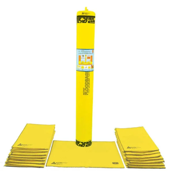 A roll of yellow landscape fabric with multiple folded sections of additional fabric, used for landscaping or gardening.