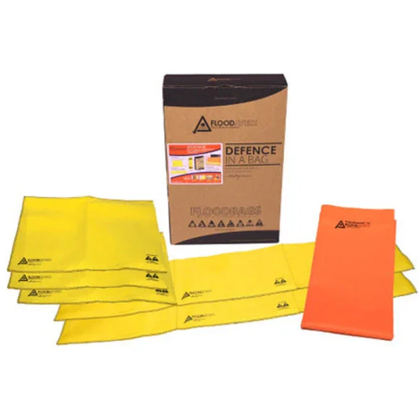 A set of yellow flood safety barriers and an orange safety barrier, with a brown box labeled 'Flood Defence in a Bag' in the background.
