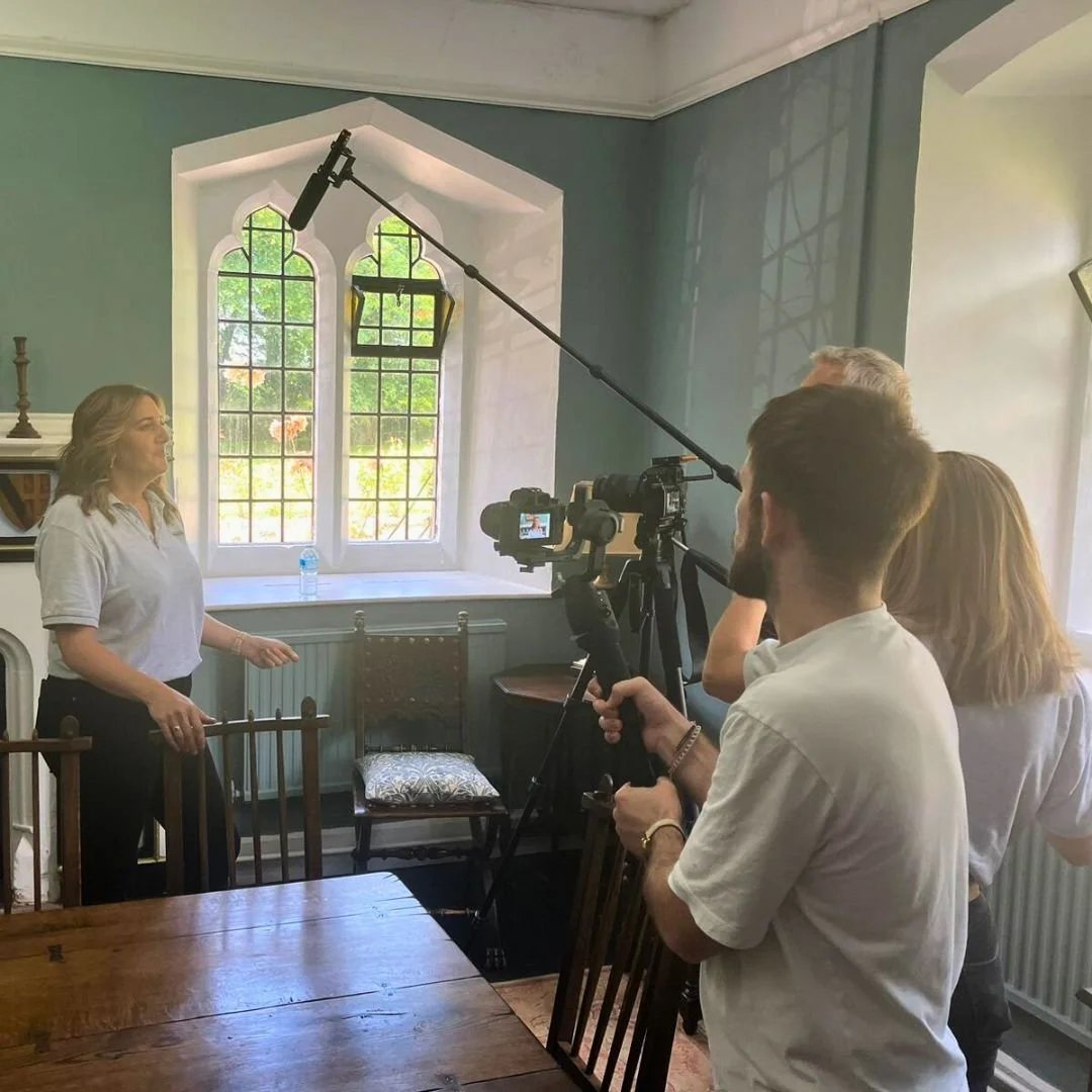 Image of Jacob filming with a video camera for a past project
