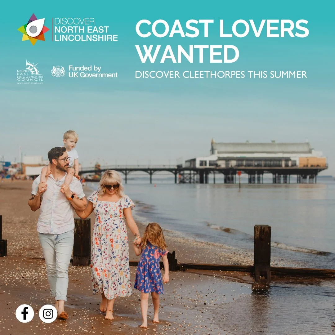 A family walking along a beach with a pier in the background, promoting coastal exploration for Northeast Lincolnshire's summer campaign.