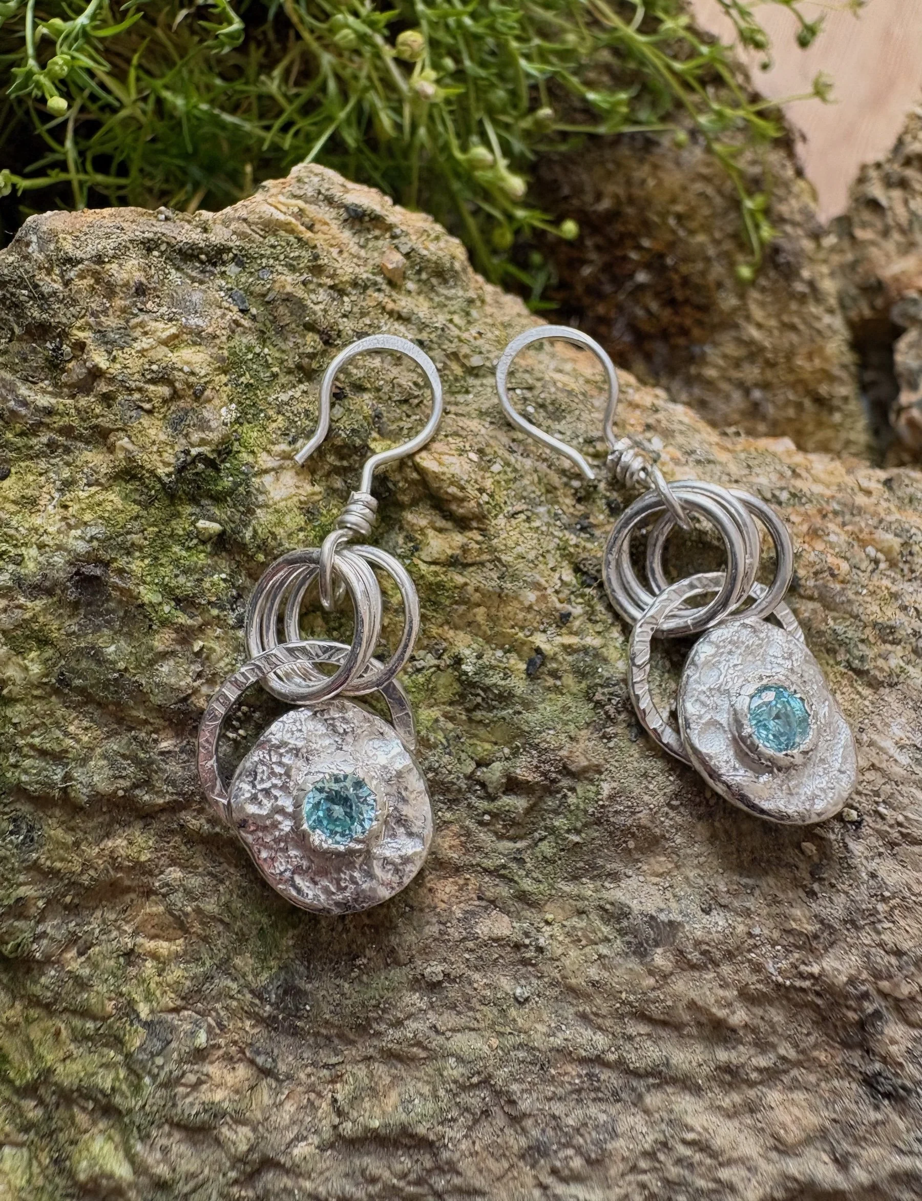 Lunar CZ Earth rise Earrings light blue.jpg