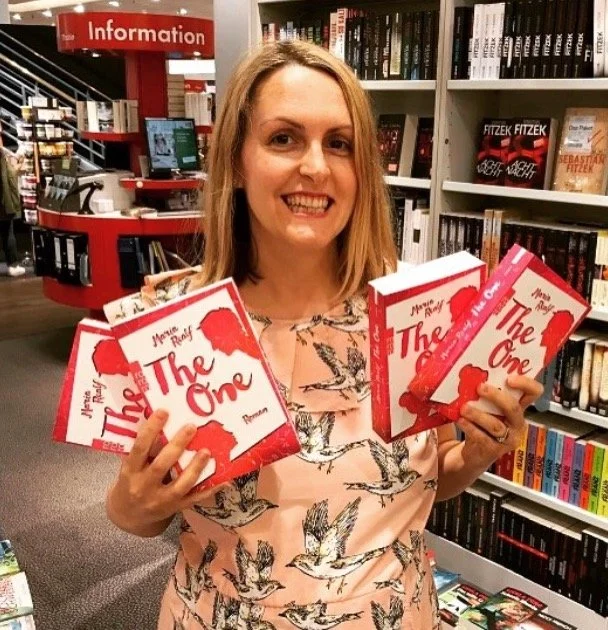 Maria with her book