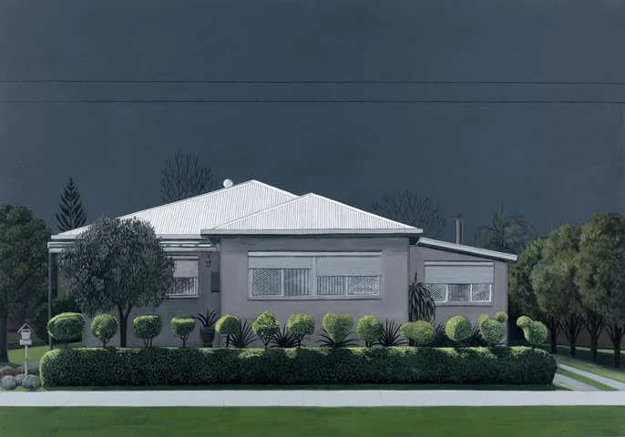 Modern house with a white roof, surrounded by neatly trimmed bushes and trees, against a dark cloudy sky.