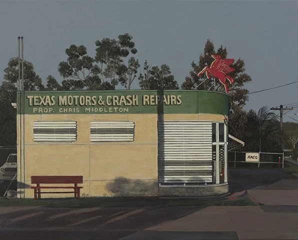An auto repair shop named Texas Motors & Crash Repairs with a green and yellow exterior, vintage signage, and a red neon clock in the shape of a cowboy on a bucking horse.