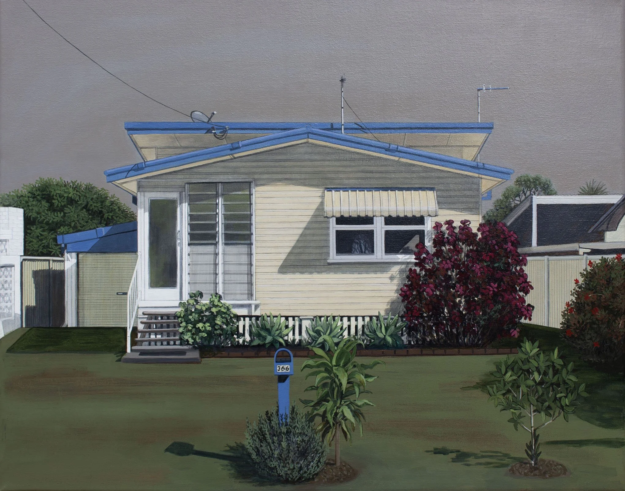 A yellow house with a blue roof and a white door, surrounded by trees and bushes, with a lawn and a blue mailbox marked 366 in the front yard.