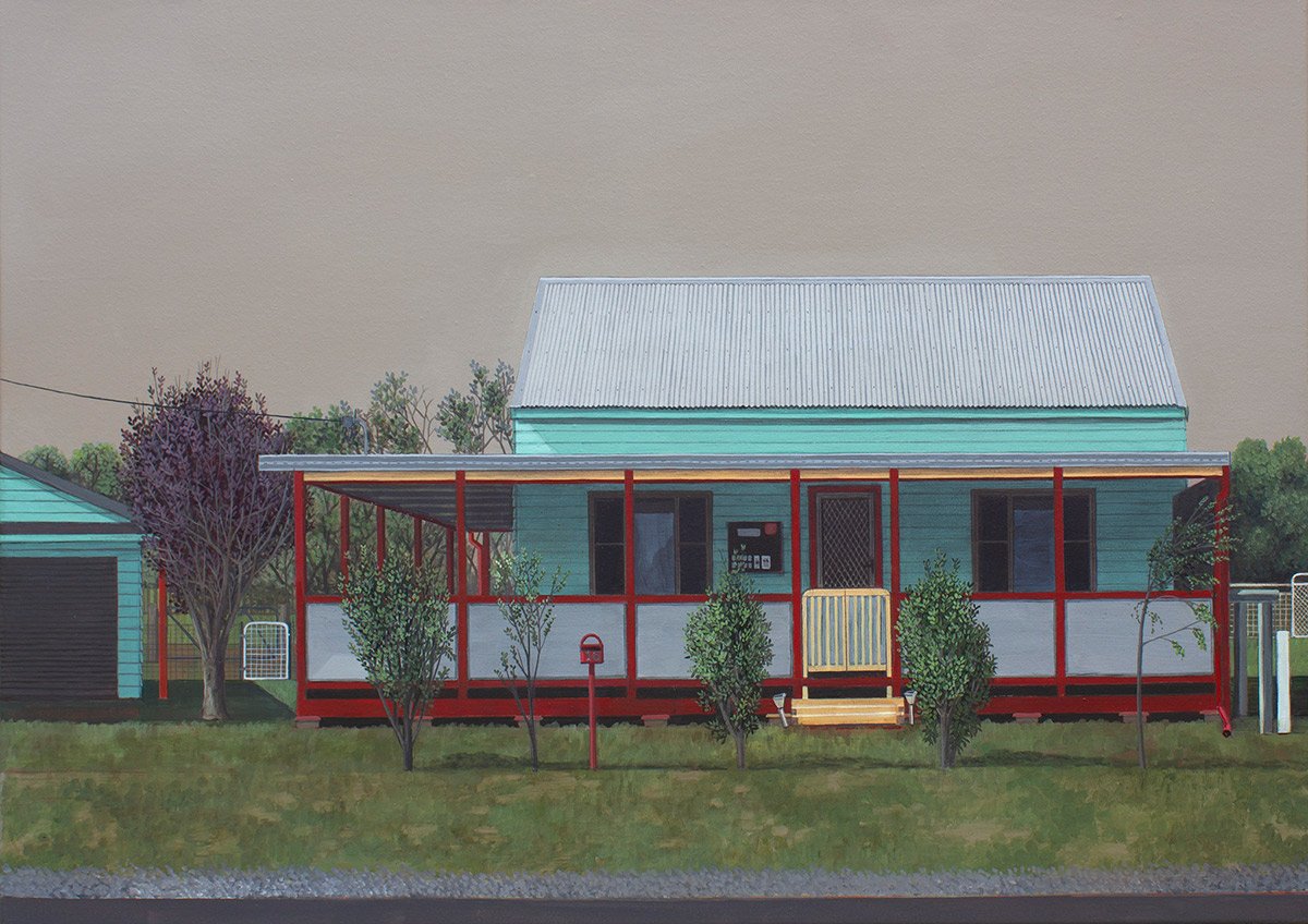 A small, two-story house with a light blue exterior, a corrugated metal roof, and a front porch with red support beams. There are four windows and a door with a screen door. The house is surrounded by five small trees and a grassy yard, with a larger
