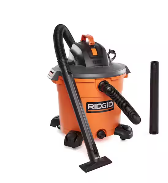 An orange Ridgid wet/dry shop vacuum with black hose and attachment, and a filter pipe beside it.