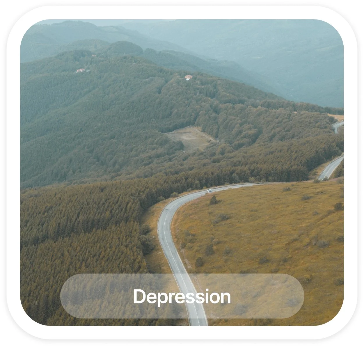 A winding road through a hilly, forested landscape with a label 'Depression' at the bottom.