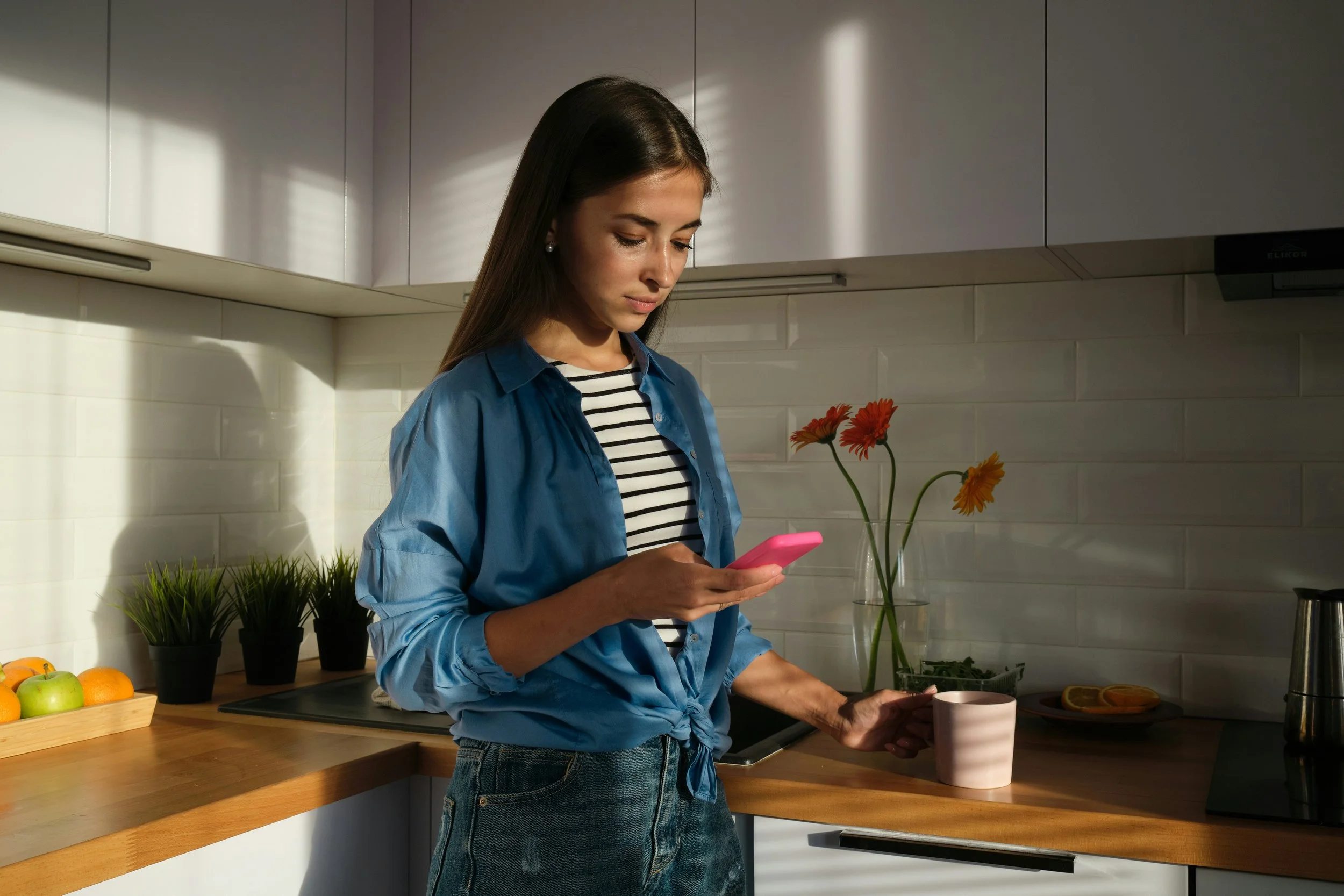 Young girl using her mobile