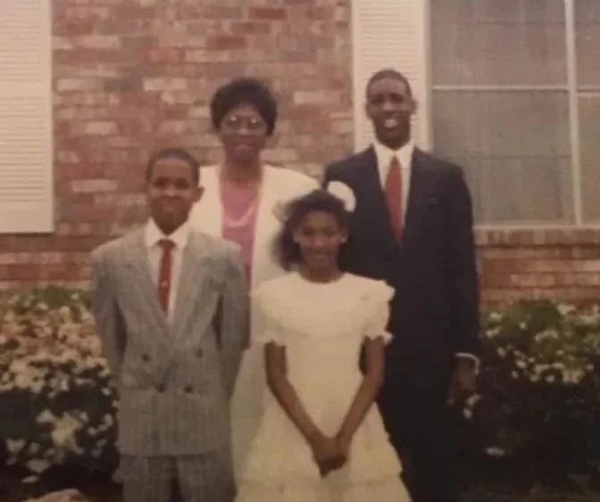 Ayana Parsons as a child with her mother, father, and brother