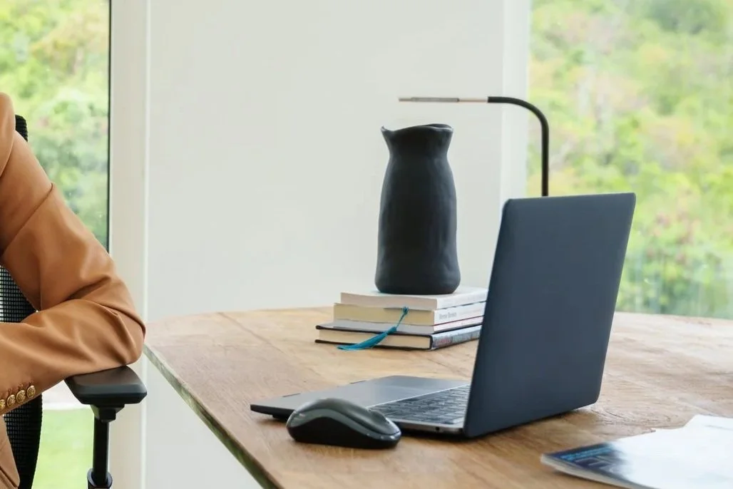 Desk with an open laptop
