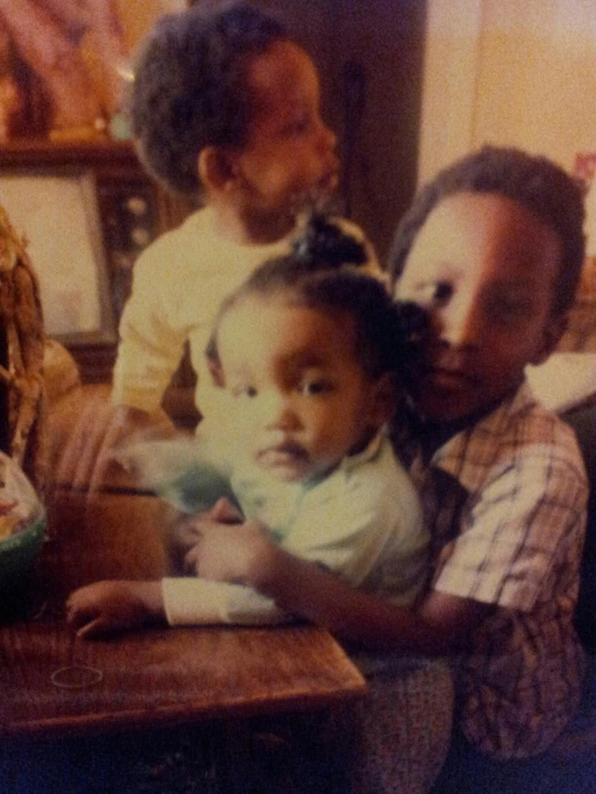 Ayana Parsons as a child with her older siblings